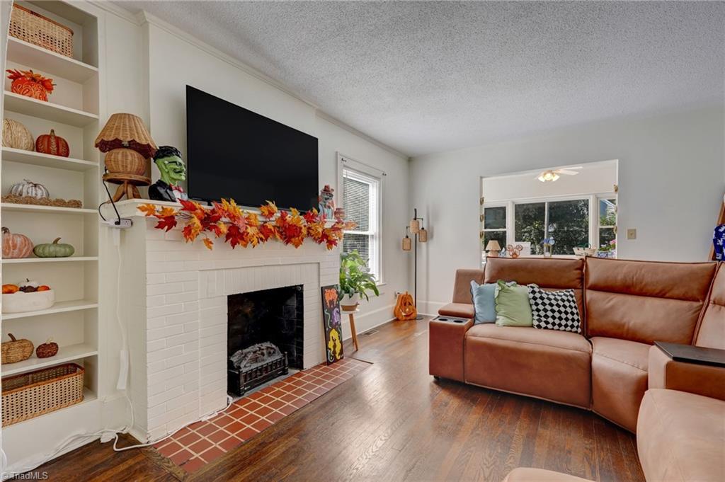 Living room with fireplace and built-ins